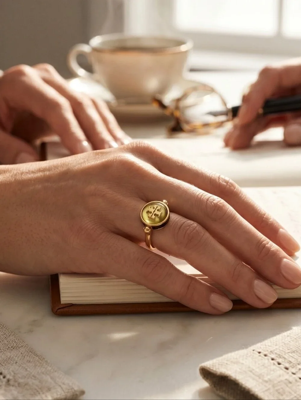 Tory Burch Kia Semiprecious Rotational Gold Ring with Light Green Logo Center